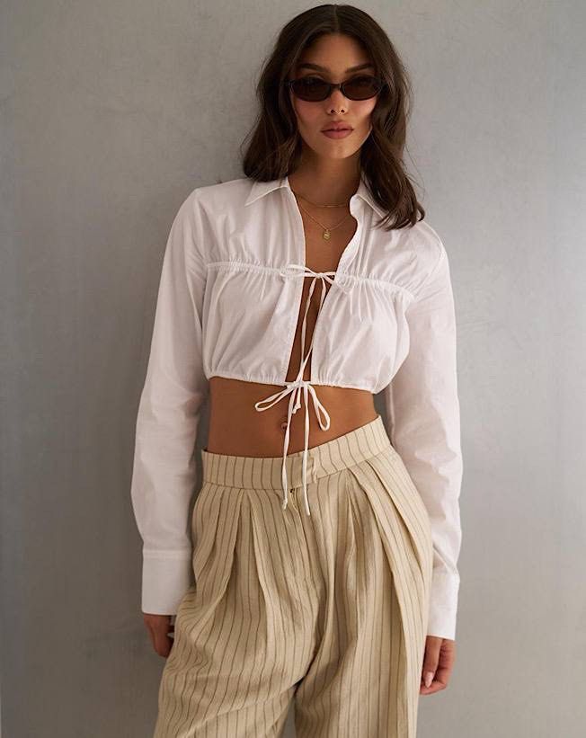 ZARA White Tie Longsleeves Top (Category: Longsleeves) located in Pasig City. Submitted by dezleemarquez (Listing ID 1466675701, Image 3). Description: ZARA White Tie Longsleeves Top.