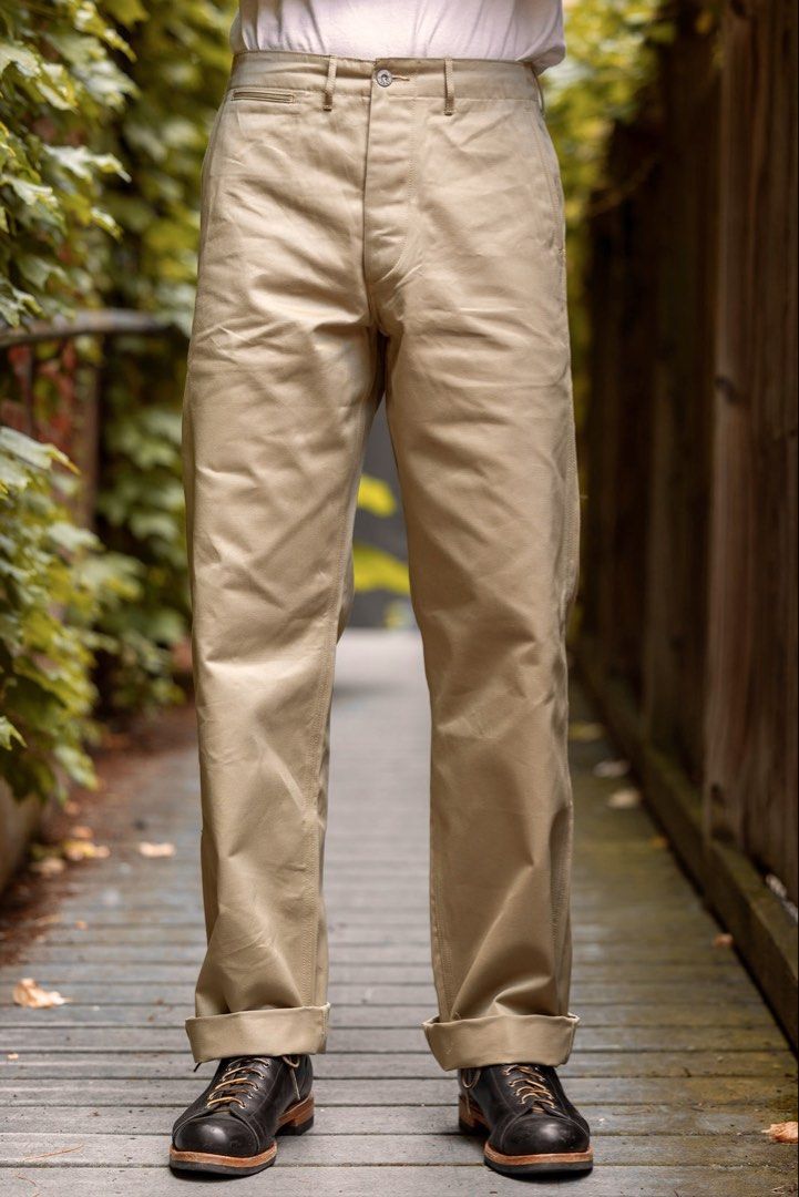 1942 Bronson US Army chino trouser (Category: Chinos) located in Manila. Submitted by store6020 (Listing ID 1466955686, Image 2). Description: 1942 Bronson US Army chino trouser This reproduction faithfully recreates the 1942 version, preserving its distinctive double welted pockets and twin-needle chain-stitch construction. Cut from 11.5 oz high density, single yarn drill fabric, it closely replicates the weight, texture, and rugged character of