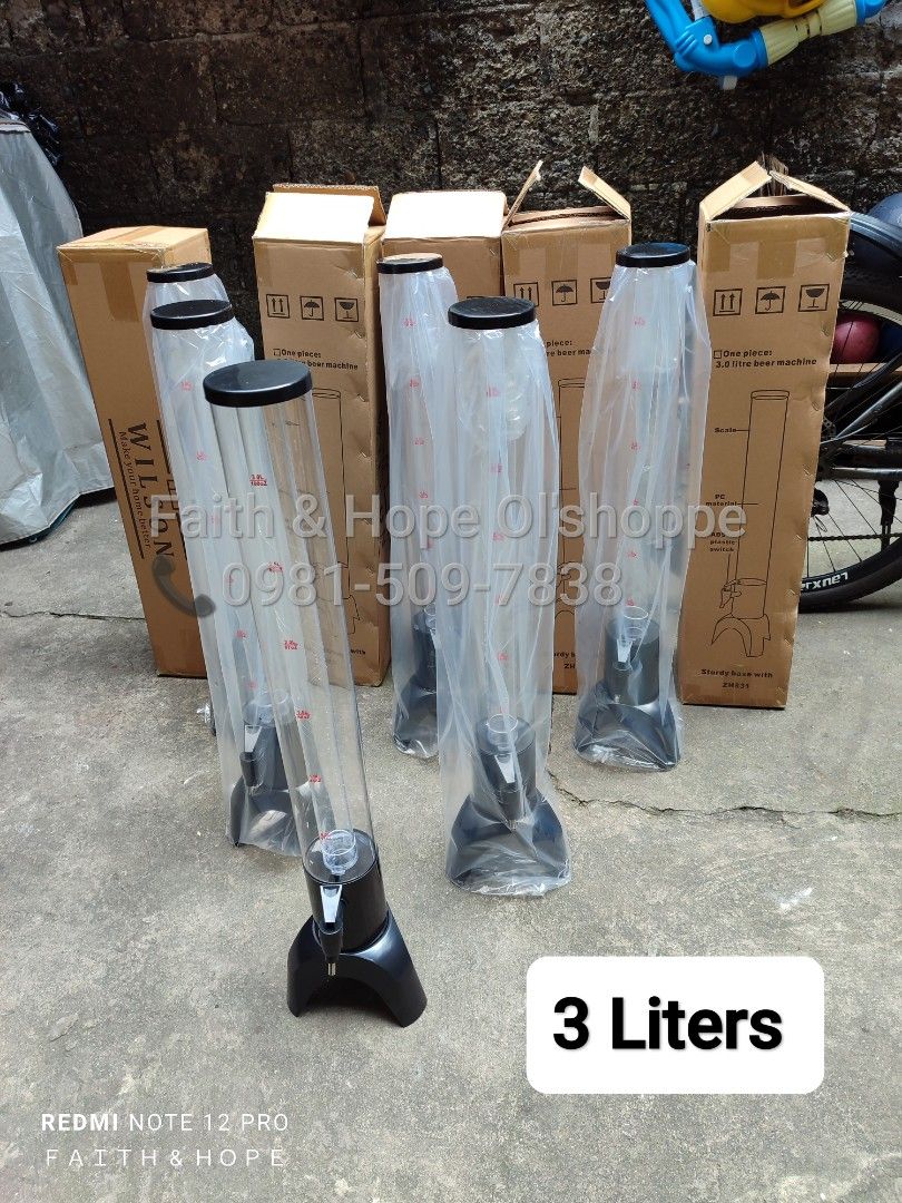 3.0L Beer Dispenser Tower (Category: Pitchers & Dispensers) located in Manila. Submitted by jamfrimzy089458 (Listing ID 1466790784, Image 3). Description: - Capacity: 3.0 liters with clear measurement markings - Perfect for beer, juice, iced tea, and other cold beverages - Ideal for parties, gatherings, buffets, and restaurant use - Features a smooth-pouring tap dispenser at the bottom - Sturdy black base for stability - Condition: Brand new in o