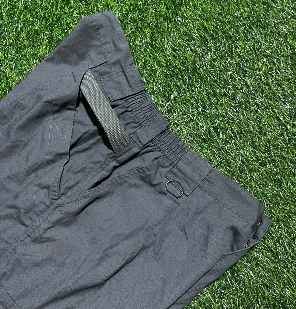 5.11 Tactical Series Cargo Pants (Category: Trousers) located in Pangantucan. Submitted by calmwhale_cb83a8 (Listing ID 1466800198, Image 3). Description: - Brand: 5.11 Tactical Series - Color: army green - Material: Durable ripstop fabric - Features: Multiple utility pockets, elastic waistband inserts for a flexible fit, and branded metal button closure - Measurements: Waist 32 to 35 inches, Length 40 inches, Leg Opening 9 inches - Condition/Use
