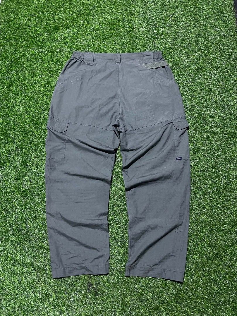 5.11 Tactical Series Cargo Pants (Category: Trousers) located in Pangantucan. Submitted by calmwhale_cb83a8 (Listing ID 1466800198, Image 2). Description: - Brand: 5.11 Tactical Series - Color: army green - Material: Durable ripstop fabric - Features: Multiple utility pockets, elastic waistband inserts for a flexible fit, and branded metal button closure - Measurements: Waist 32 to 35 inches, Length 40 inches, Leg Opening 9 inches - Condition/Use