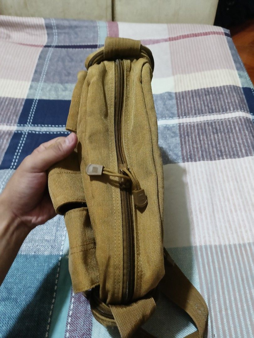 5.11 Tactical Shoulder Sling Bag Brown (Category: Sling Bags) located in Quezon City. Submitted by jdwoah12 (Listing ID 1466818580, Image 2). Description: - Color: Brown - Durable material built for everyday use - Multiple front pockets with velcro flaps for extra gear - Wide-opening main compartment with zipper - Secure zipper pocket at the back - Adjustable shoulder strap with padded cushion for maximum comfort.
