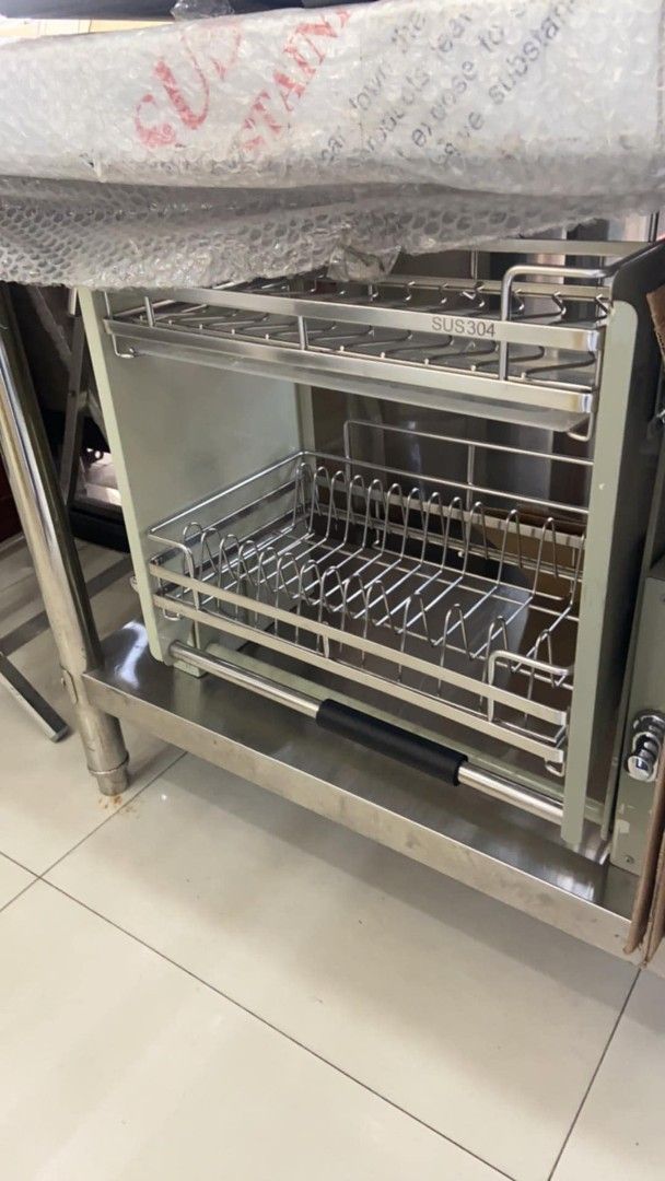 60 cm SUS304 Stainless Steel Pull Out Dish Rack (Category: Bathroom & Kitchen Fixtures) located in Manila. Submitted by jamfrimzy089458 (Listing ID 1466832902, Image 2). Description: - Material: Premium SUS304 stainless steel for rust resistance - Size: 60 cm 2-tier design with convenient pull-out mechanism - Space Saver: Designed to fit inside upper kitchen cabinets to keep counters clear - Features: Built-in drip trays and sturdy wire construct