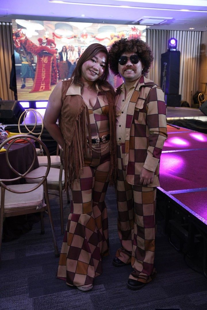70s Disco Vibe Checkered Jumpsuit Costume (Category: Jumpsuits) located in Manila. Submitted by mr_chaser (Listing ID 1466873835, Image 2). Description: - Style: 70s retro checkered jumpsuit in brown, tan, and maroon - Design: Sleeveless V-neck with flared bell-bottom legs - Included: Matching brown fringe vest and belt - Perfect for: Halloween, themed parties, and costume events - Sizing: Standard adult sizing - original price Php 1200 -Used onc