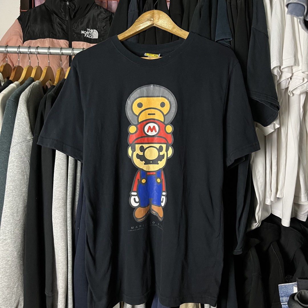 A Bathing Ape (BAPE) x Super Mario (Category: Formal Shirts) located in Daet. Submitted by wearthriftingcloth. (Listing ID 1466932175, Image 1). Description: 👕BAPE Size:M-L Measurement: W21x29 Issue(s): NONE Condition: 9.5/10 Color rate: 9/10 ➡️Swipe- to see more detail pic 📌No Deleting/Cancelation‼️ 📌Color may Vary Due to Lighting‼️ 📌Please be responsible buyer Bogus/Flaker will be posted‼️ 📌All ltems Need Wash‼️.