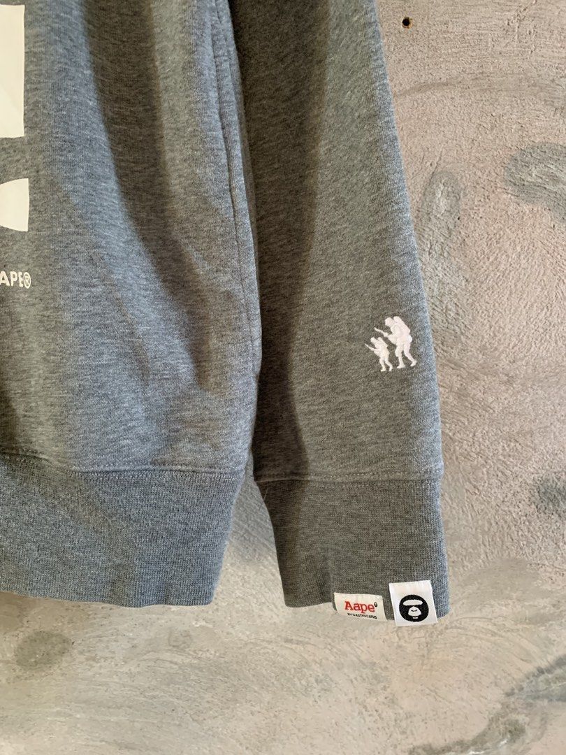 Aape hoodie (Category: Activewear) located in Famy. Submitted by stuffxsogood. (Listing ID 1466858785, Image 3). Description: Aape A Bathing Ape hoodie Authentic Medium 21x26 Good as new.