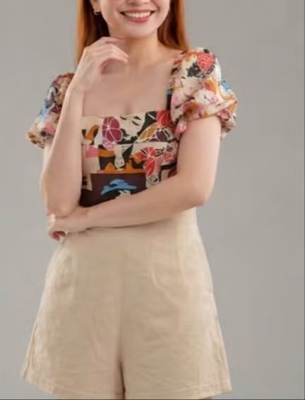 Abstract print square neck top with beige shorts (Category: Sets or Coordinates) located in Binan City. Submitted by bryleonlineshop16 (Listing ID 1466941701, Image 2). Description: - 2-piece matching set for effortless styling - Top: Square neckline, colorful abstract print, puff sleeves - Bottoms: Solid beige, high-waisted, with functional side pockets - Perfect for daytime wear, brunch, or casual errands - Versatile pieces that can be mixed an
