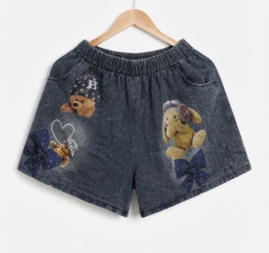 Acidwash Teddy Bear Soft Denim Matching Sets (Category: Sets or Coordinates) located in Quezon City. Submitted by panapton.ph (Listing ID 1466782916, Image 3). Description: -FLASH SALE ONLY 500 - Brandnew Soft Denim Set -Actual item post -Size Tops fit 34 to 46bust Top: Oversized short-sleeve tee with a contrasting brown ribbed crew neckline and a bold teddy bear graphic print -Bottoms: Matching elastic-waist shorts equipped with deep pockets and