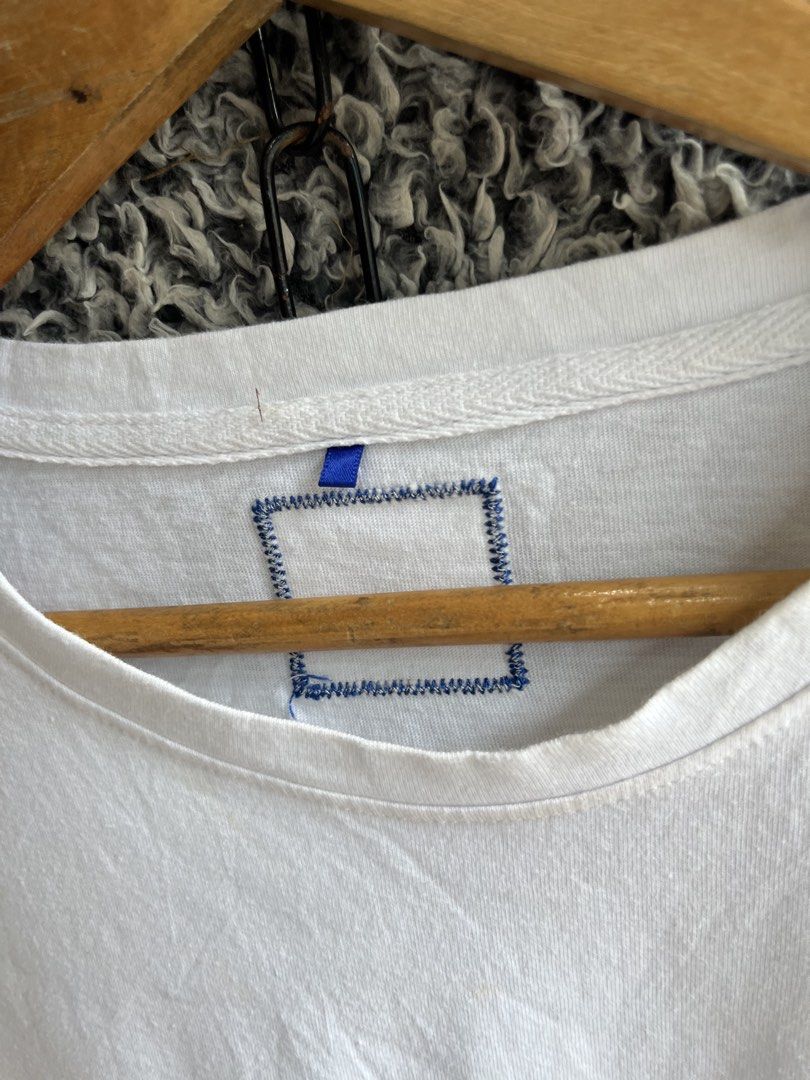 Ader Error Embroidered Logo Tee | Size M to L (Category: Shirts) located in General Trias. Submitted by zrchustle.604 (Listing ID 1466823357, Image 3). Description: Ader Error Embroidered Logo Tee featuring a distinctive multi-color textured logo graphic across the chest. • Design: Short-sleeve cotton crewneck t-shirt in white with a colorful embroidered "ADER" block letter graphic on the front. • Details: Features the signature multi-colored emb