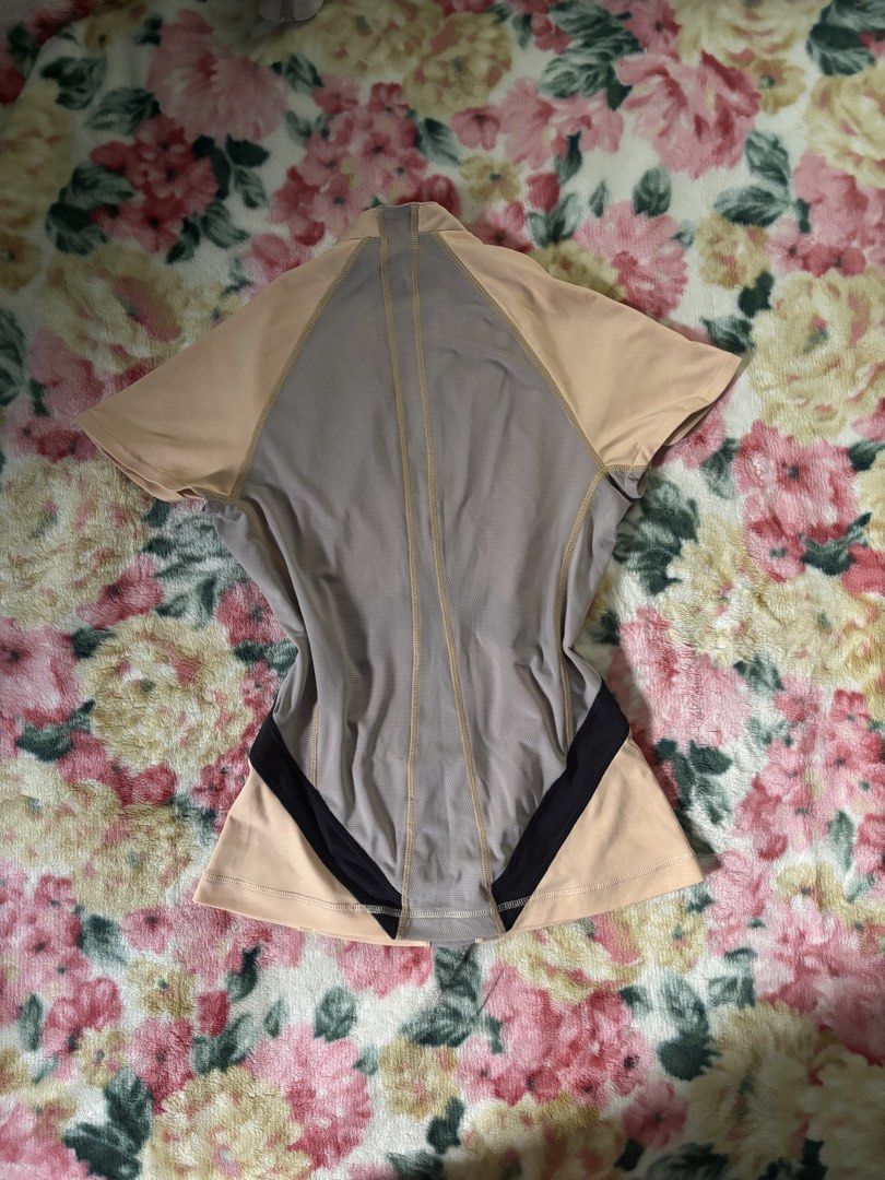 Adidas Climacool Peach and Grey Athletic Top (Category: Activewear) located in Davao. Submitted by curatedfindx (Listing ID 1466782522, Image 2). Description: Peach and grey Adidas athletic top with black contrast and a V-neck. Features breathable mesh panels, a gold logo, and Climacool tech. Fitted short-sleeve style. small-med.