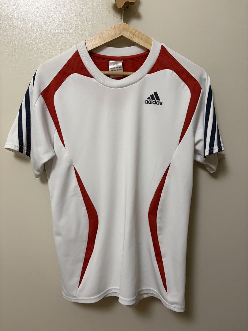 Adidas Climacool Athletic Drifit Shirt (Category: Shirts) located in Paranaque City. Submitted by theartoflettinggo (Listing ID 1466906155, Image 1). Description: Adidas athletic t-shirt in white with red and navy blue detailing. Size S on the tag (19x24) Climacool technology for workouts or running. Classic three stripes on both sleeves. Clean overall except for one faint tiny dot stain on the back right sleeve. .