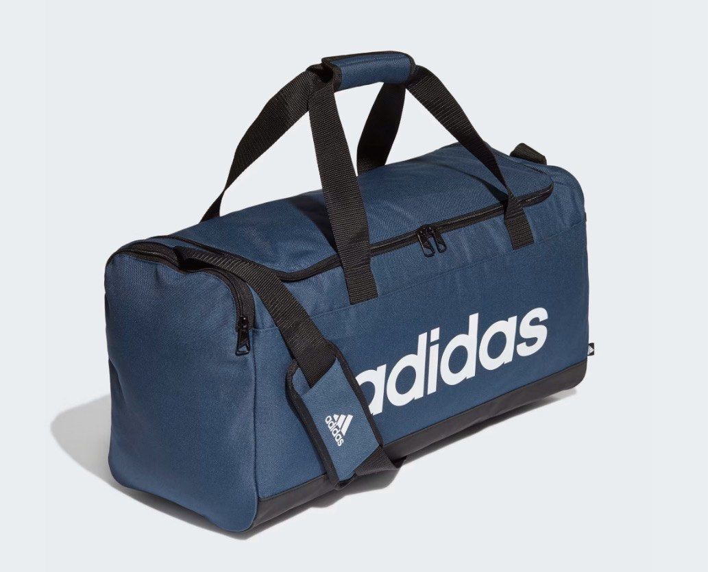 ADIDAS essentials logo duffel bag medium (Category: Sling Bags) located in Manila. Submitted by santanajdd (Listing ID 1466837463, Image 3). Description: adidas essential logo duffel bag medium * spacious main compartment * durable fabric & comfortable * great for gym, sports, travel, or everyday use 💬 price is nego ! dm for more deets 📍 based in metro manila.