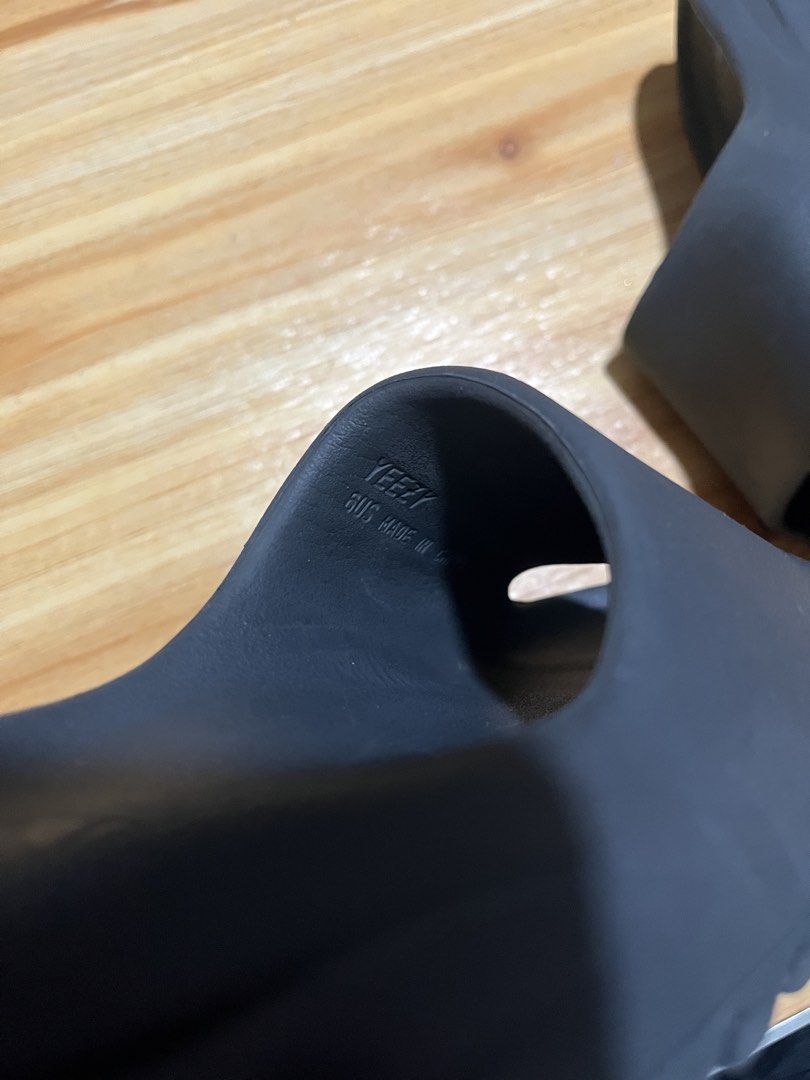 Adidas Yeezy Slides Onyx Size 6 US (Category: Slippers & Slides) located in Naga. Submitted by stoob.finds (Listing ID 1466806655, Image 3). Description: - Brand/Model: Adidas Yeezy Slides - Colorway: slate gray - Size: 6 US -23cm - Condition: Lightly used with minimal signs of wear on soles and upper - Design: Slip-on style featuring a textured footbed, iconic serrated outsole, and subtle branding on the heel and inner strap - Deal: Ships fast f