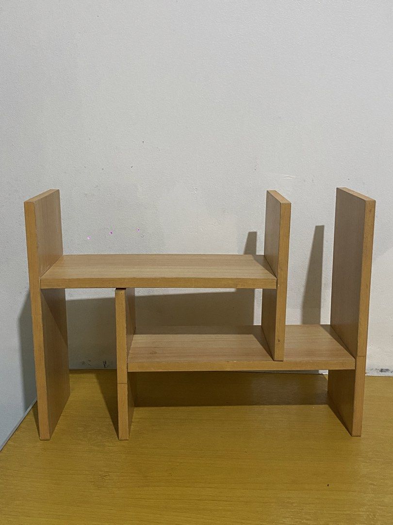 Adjustable Desktop Bookshelf Storage Rack Wood Color (Category: Shelves, Cabinets & Racks) located in Malabon City. Submitted by styled_by.aries (Listing ID 1466945301, Image 2). Description: - NO COD - Pick-up or lalamove (shouldered by buyer) - Location: Malabon - Adjustable length design to fit any desk space - Natural wood grain finish that matches any room aesthetic - Ideal for organizing books, stationery, and small decor - Space-saving sol