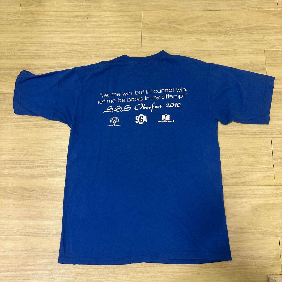 ALADIN DISNEY SHIRT (Category: Tshirts & Polo Shirts ) located in Caloocan City. Submitted by pablow.escobart (Listing ID 1466920808, Image 2). Description: Blue graphic t-shirt featuring Aladdin and the Genie on the front with the text "You Ain't Never Had A Friend Like Me". Back features Special Olympics quote and text "SSS Oberfest 2010" along with sponsor logos. Short sleeves, crew neck. Cotton material, standard fit. Great vintage look for D
