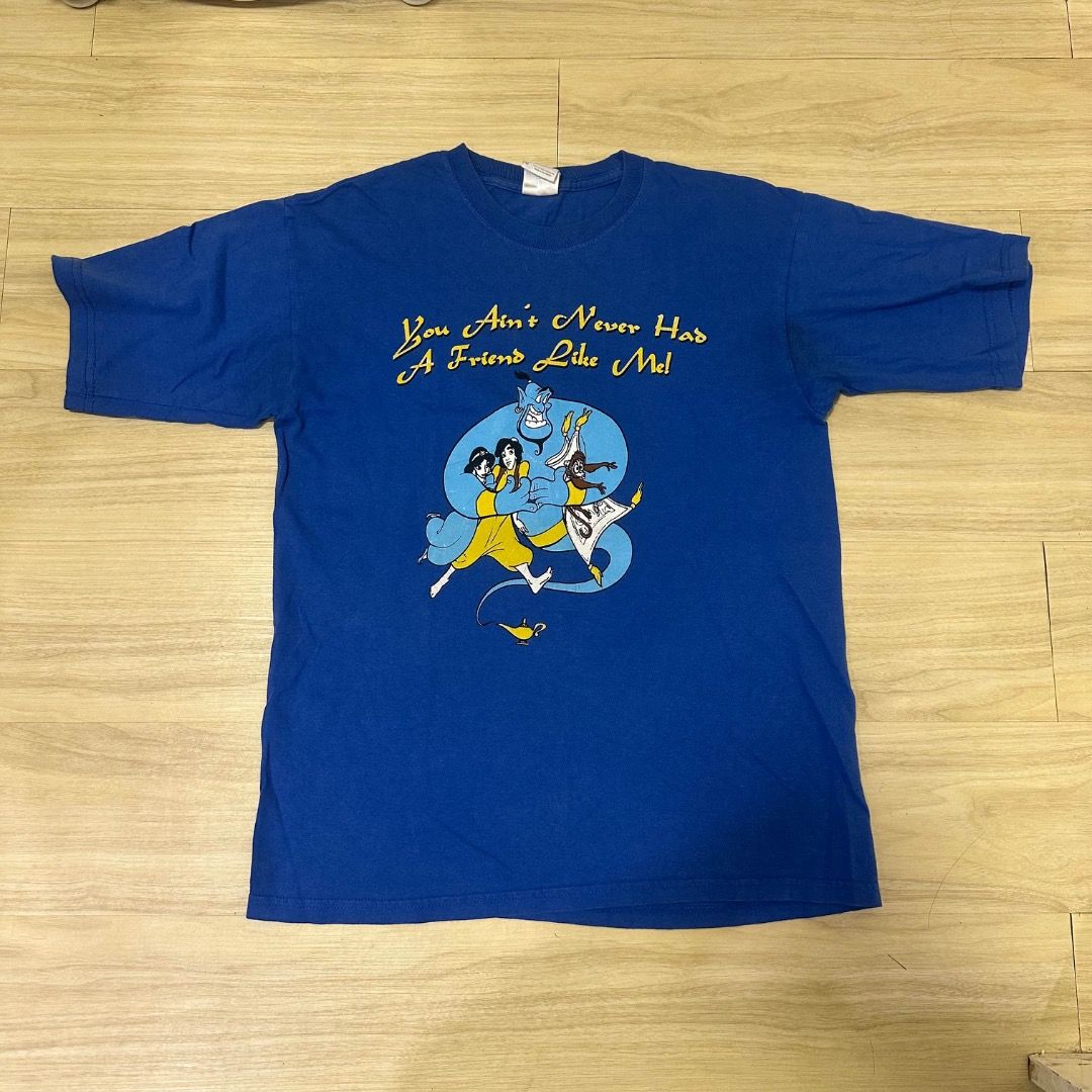 ALADIN DISNEY SHIRT (Category: Tshirts & Polo Shirts ) located in Caloocan City. Submitted by pablow.escobart (Listing ID 1466920808, Image 1). Description: Blue graphic t-shirt featuring Aladdin and the Genie on the front with the text "You Ain't Never Had A Friend Like Me". Back features Special Olympics quote and text "SSS Oberfest 2010" along with sponsor logos. Short sleeves, crew neck. Cotton material, standard fit. Great vintage look for D