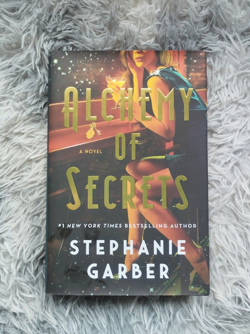 ALCHEMY OF SECRETS (HARDBOUND, SPRAYED) BY STEPHANIE GARBER (Category: Storybooks) located in Bantayan. Submitted by book_island_ph (Listing ID 1466822194, Image 1). Description: MAKE READING A HABIT ‼️‼️‼️ AVAILABLE IF YOU CAN MAKE AN OFFER. PLEASE DON'T WASTE MY REPLY QUOTA IF NOT SURE BUYER. Swipe to left to see additional details/photos of the book. Pictures of the books are posted for hassle free transactions, no unnecessary photo request pl