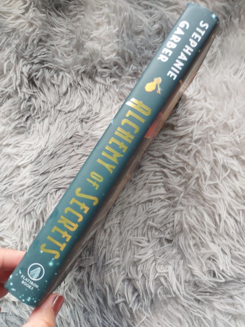 ALCHEMY OF SECRETS (HARDBOUND, SPRAYED) BY STEPHANIE GARBER (Category: Storybooks) located in Bantayan. Submitted by book_island_ph (Listing ID 1466822194, Image 2). Description: MAKE READING A HABIT ‼️‼️‼️ AVAILABLE IF YOU CAN MAKE AN OFFER. PLEASE DON'T WASTE MY REPLY QUOTA IF NOT SURE BUYER. Swipe to left to see additional details/photos of the book. Pictures of the books are posted for hassle free transactions, no unnecessary photo request pl