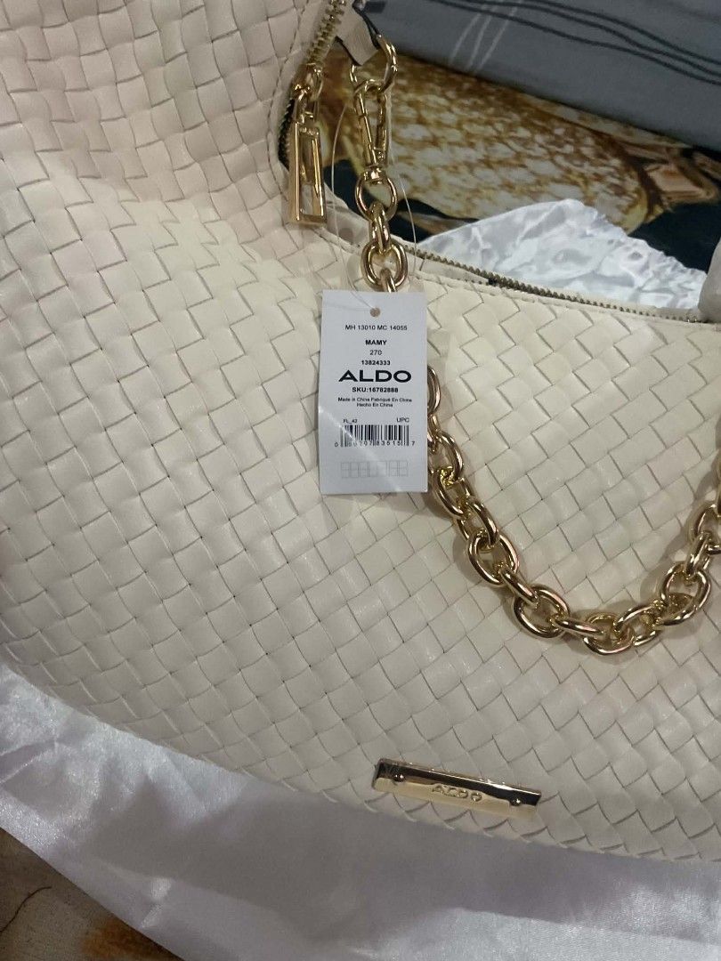 Aldo bag (Category: Shoulder Bags) located in Dasmarinas. Submitted by erljapan (Listing ID 1466912577, Image 3). Description: The ALDO Mamy shoulder bag comes in a single size ("One Size") with the following dimensions: Length: 15.5 inches (approx. 45 cm) Height: 8.5 inches (approx. 48 cm including the strap/handle structure) Width: 1.5 inches (approx. 12 cm maximum expansion) Handle Drop: 10 inches (25.4 cm).