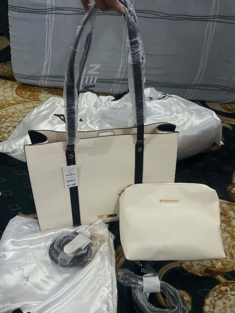 Aldo tote bag (Category: Tote Bags) located in Dasmarinas. Submitted by erljapan (Listing ID 1466914707, Image 2). Description: Style Notes We’re loving the clean, simple lines of this roomy top-zip Adalyn satchel. Perfect for toting keys, cards, phones, and more while looking supremely organized and seriously upmarket. Details Main Material: Synthetic Handbag Dimensions: 39 CM x 31 CM x 14 CM Handbag Drop Length: Not assigned Strap Length: 23.00