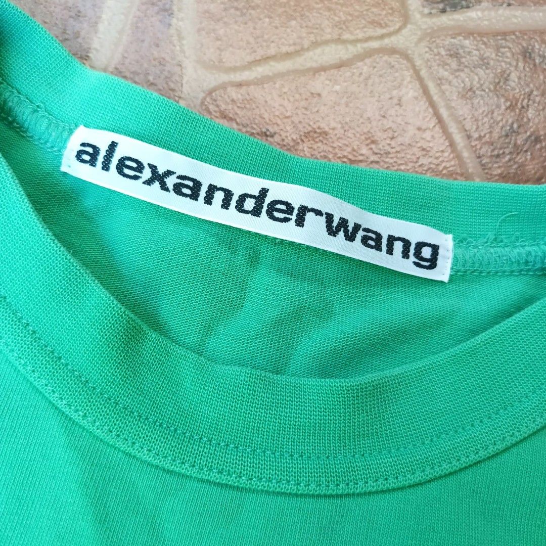 alexander wang Green T-shirt (Category: Tshirts & Polo Shirts ) located in Caloocan City. Submitted by jamesmiguelgggg (Listing ID 1466810445, Image 2). Description: Alexander Wang Embossed Shirt Size Small on tag Dimensions: Width: 19.5 inches Length: 27 inches Issue/s: none Condition: Excellent Mine: ₱530 + shipping fee GCash Payment only (PAYMENT FIRST) Courier: J&T or Lalamove Color may vary due to lighting..