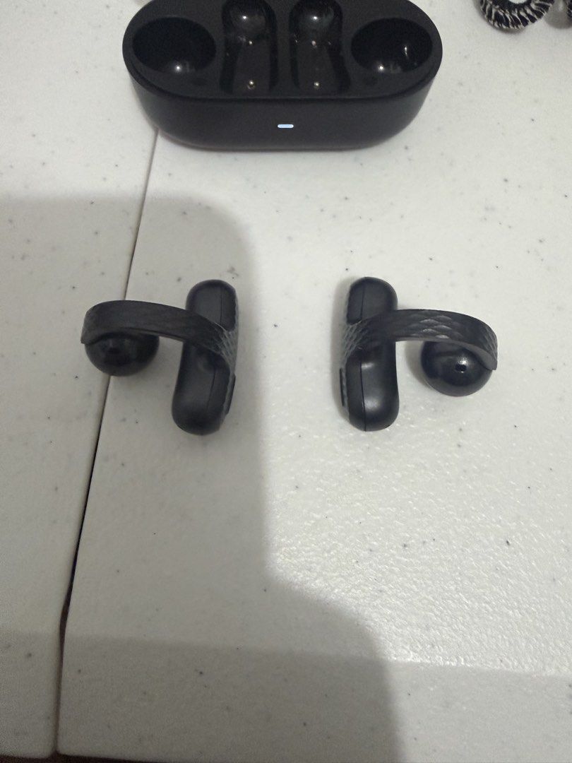 Amazfit Up Open-Ear Earbuds (Category: Earphones) located in Marikina City. Submitted by pong15 (Listing ID 1466891590, Image 2). Description: - Model: Amazfit Up Open-Ear Wireless Earbuds - Color: Black - Includes charging case - Key feature: Open-ear design lets you stay aware of your surroundings - Connectivity: Supports multipoint pairing - Condition note: Left earbud works and shows 100% battery, but right earbud is currently not connecting 