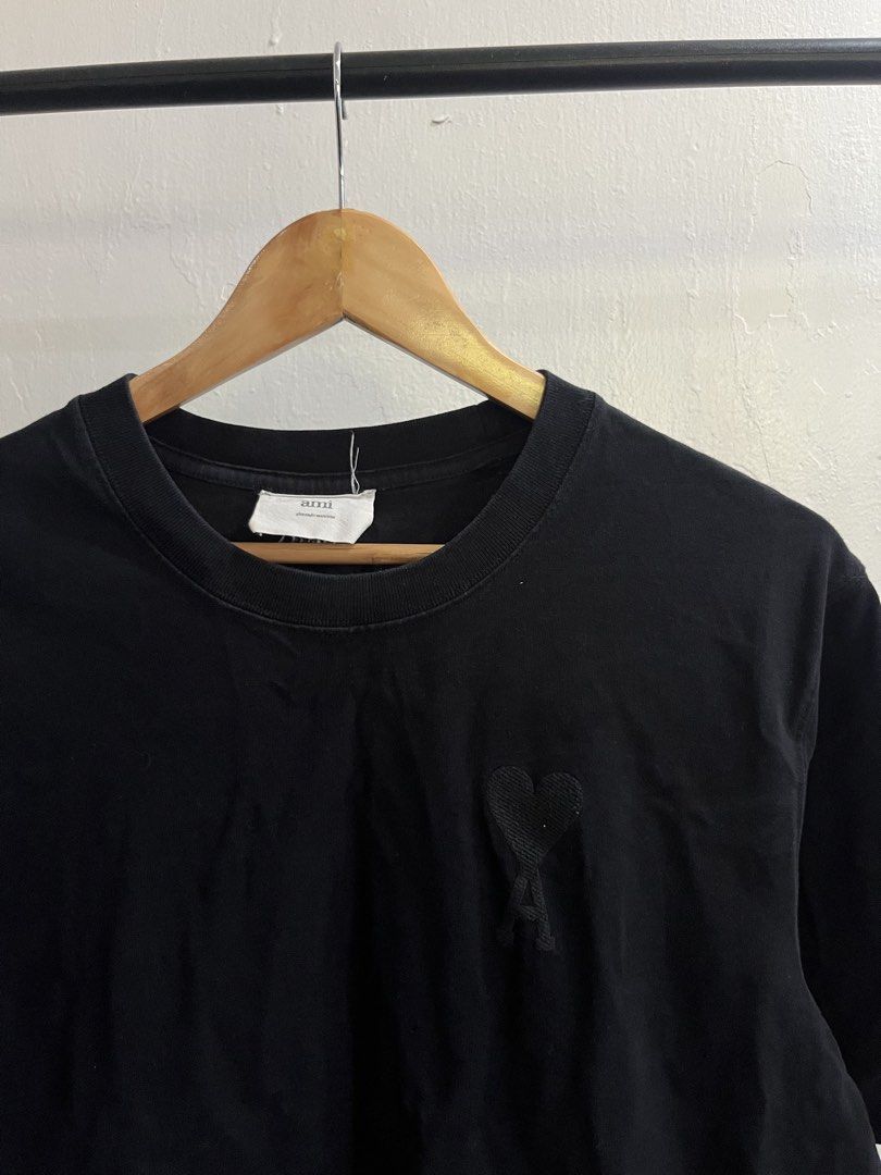 Ami Paris Monotone Tee (Category: Luxury Apparel) located in Virac. Submitted by _thecave (Listing ID 1466832499, Image 2). Description: Ami Paris Monotone Black Like New 9.5/10 Color Rate No Flaws Fits Size: M-L Width: 21.5 Length: 27 P700 + SF .