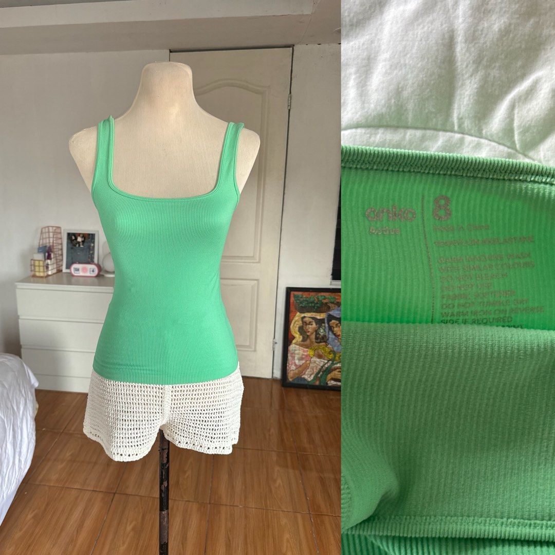 Anko Active Green Ribbed Tank Top Size 8 (Category: Sleeveless) located in Naga. Submitted by maartsy.co (Listing ID 1466885298, Image 1). Description: - Brand: Anko Active - Size: 8 - Color: Bright green - Style: Ribbed tank top with scoop neckline and thick straps - Fit: Snug and stretchy - Condition: Excellent, clean with no stains or damage - Versatile for workouts or casual everyday wear.
