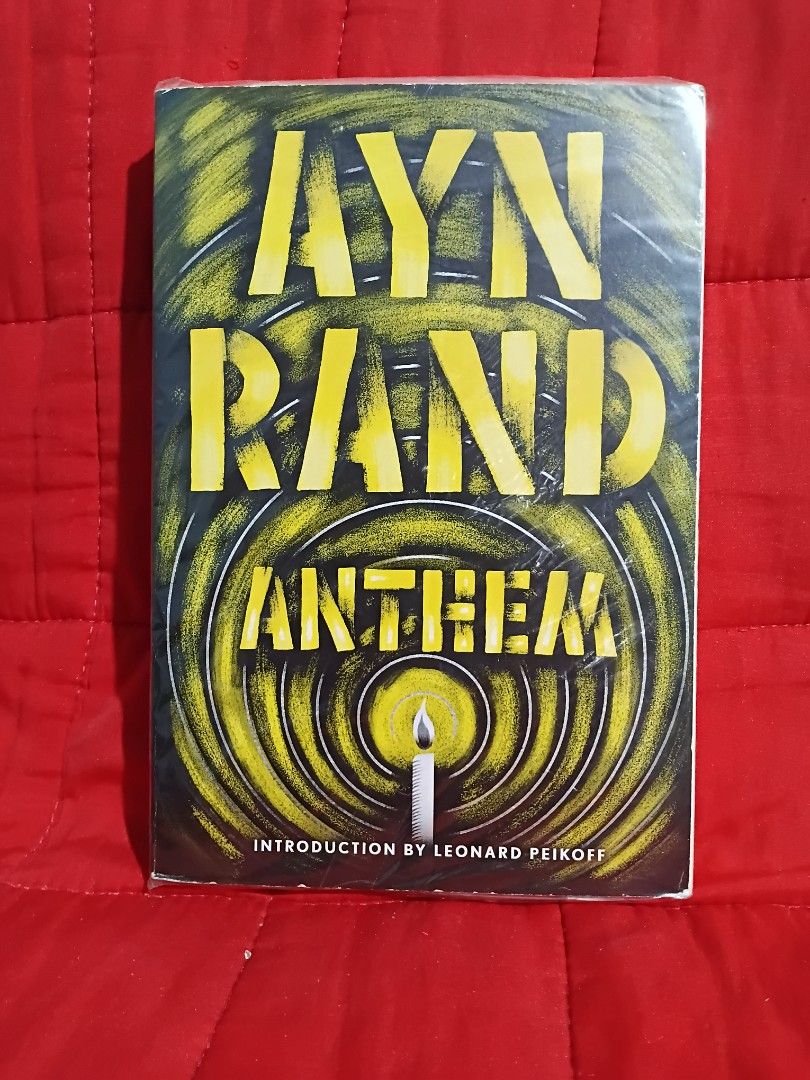 Anthem by Ayn Rand Paperback Book (Category: Storybooks) located in Manila. Submitted by krishna_ayanami (Listing ID 1466887386, Image 1). Description: - Title: Anthem by Ayn Rand - Genre: Classic dystopian novella (Individualism vs. Collectivism) - Format: Paperback with distinctive yellow/black cover art - Features: Includes introduction by Leonard Peikoff - Condition: Clean pages, excellent for reading and collecting.