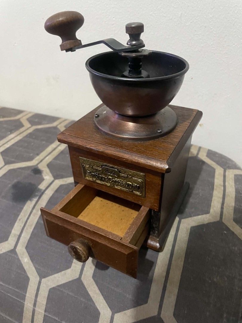 Antique coffee mill (Category: Vintage Collectibles) located in Manila. Submitted by esskkeeyy_thriftzone (Listing ID 1466797796, Image 1). Description: Antique coffee mill bigay lang po sakin ng Lola ko hindi mahilig sa kape.