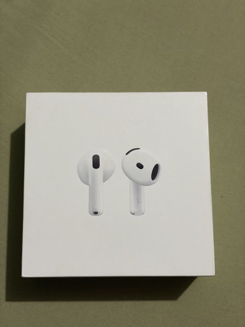 Apple AirPods 4 (Category: Headphones & Headsets) located in Dasmarinas. Submitted by wendell1 (Listing ID 1466848503, Image 2). Description: - Brand: Apple - Model: AirPods 4 (White) - Condition: Brand new, factory-sealed, and unopened - Authenticity: 100% genuine Apple accessory - Details: Retail sticker attached on the back, ready for use.