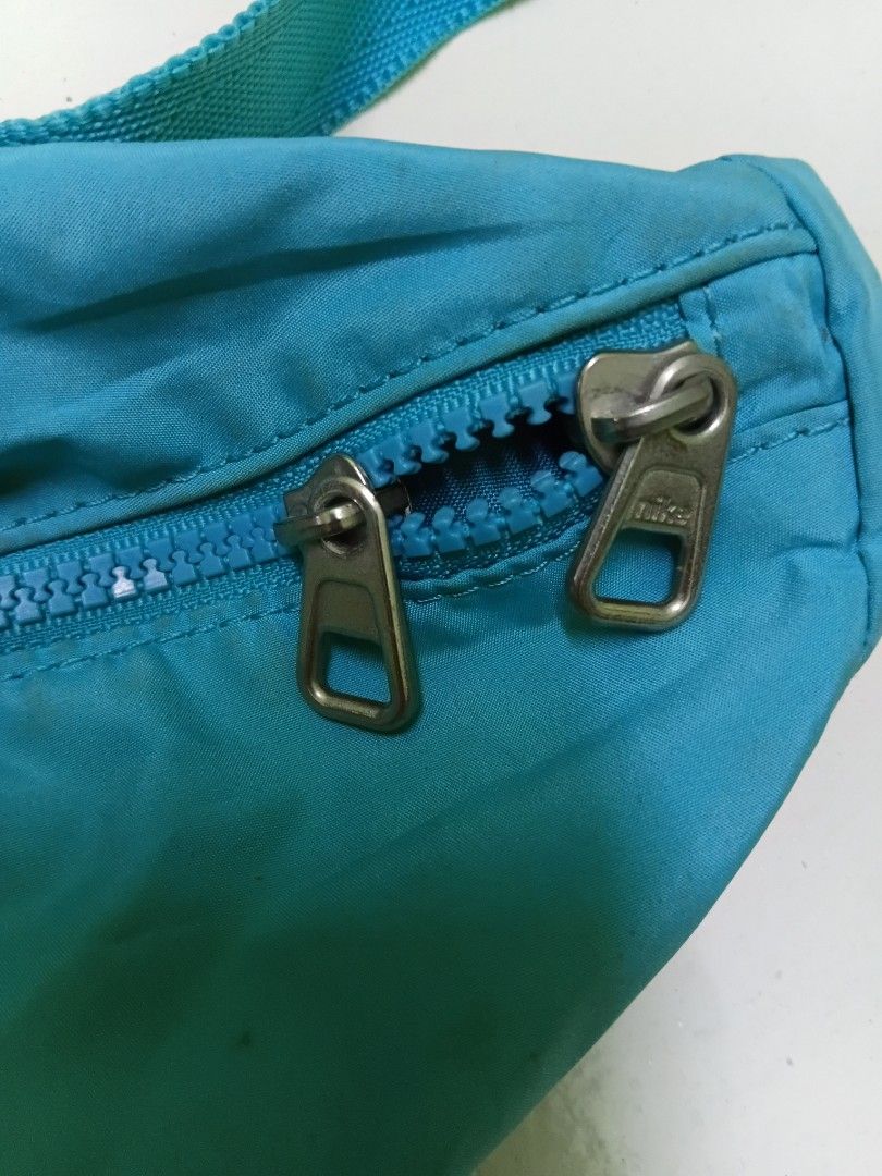 Aqua blue nike beltbag (Category: Belt bags, Clutches and Pouches) located in Manila. Submitted by daphnefinds (Listing ID 1466959359, Image 2). Description: need wash lng.