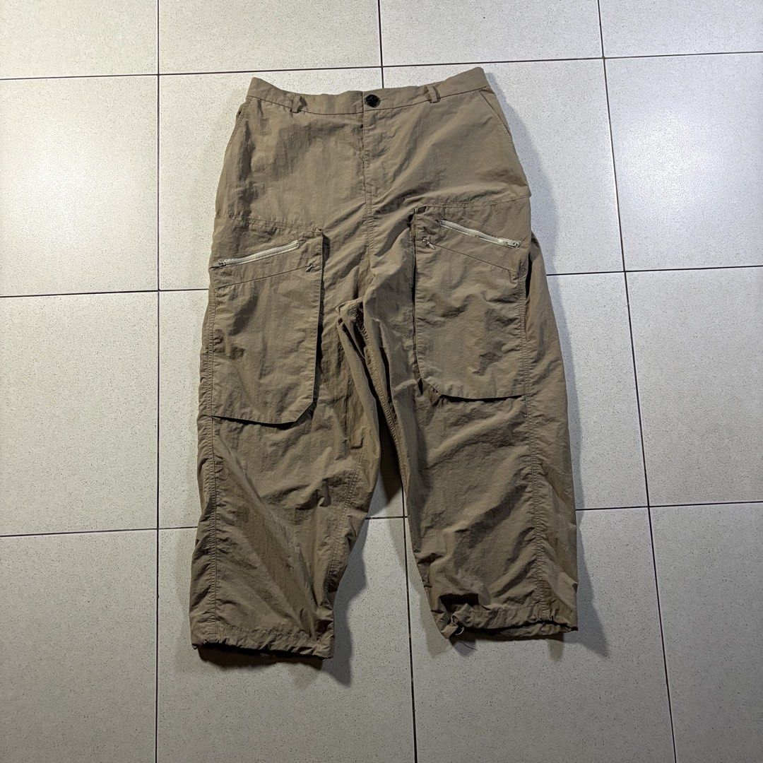 Archival Reinvent JP 3D Multipocket 2.5 Disk Nylon Pants in Brown (Category: Trousers) located in Manila. Submitted by yama_archive (Listing ID 1466915557, Image 2). Description: Archival Reinvent JP 3D Multipocket 2.5 Disk Nylon Pants in Brown Dimes (inches starting from 0) — - Size on tag: XL - Waist: 36 - Length: 36.5 - Thigh: 14.5 - Leg Opening: 9 ₱2000 Issues: ❌ Condition: 10/10 Color rate: 10/10.