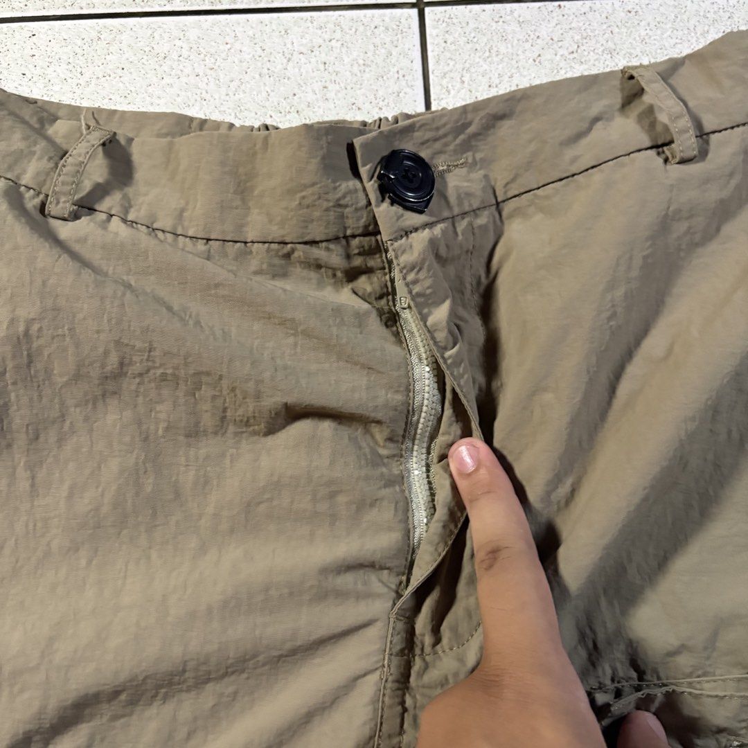 Archival Reinvent JP 3D Multipocket 2.5 Disk Nylon Pants in Brown (Category: Trousers) located in Manila. Submitted by yama_archive (Listing ID 1466915557, Image 3). Description: Archival Reinvent JP 3D Multipocket 2.5 Disk Nylon Pants in Brown Dimes (inches starting from 0) — - Size on tag: XL - Waist: 36 - Length: 36.5 - Thigh: 14.5 - Leg Opening: 9 ₱2000 Issues: ❌ Condition: 10/10 Color rate: 10/10.
