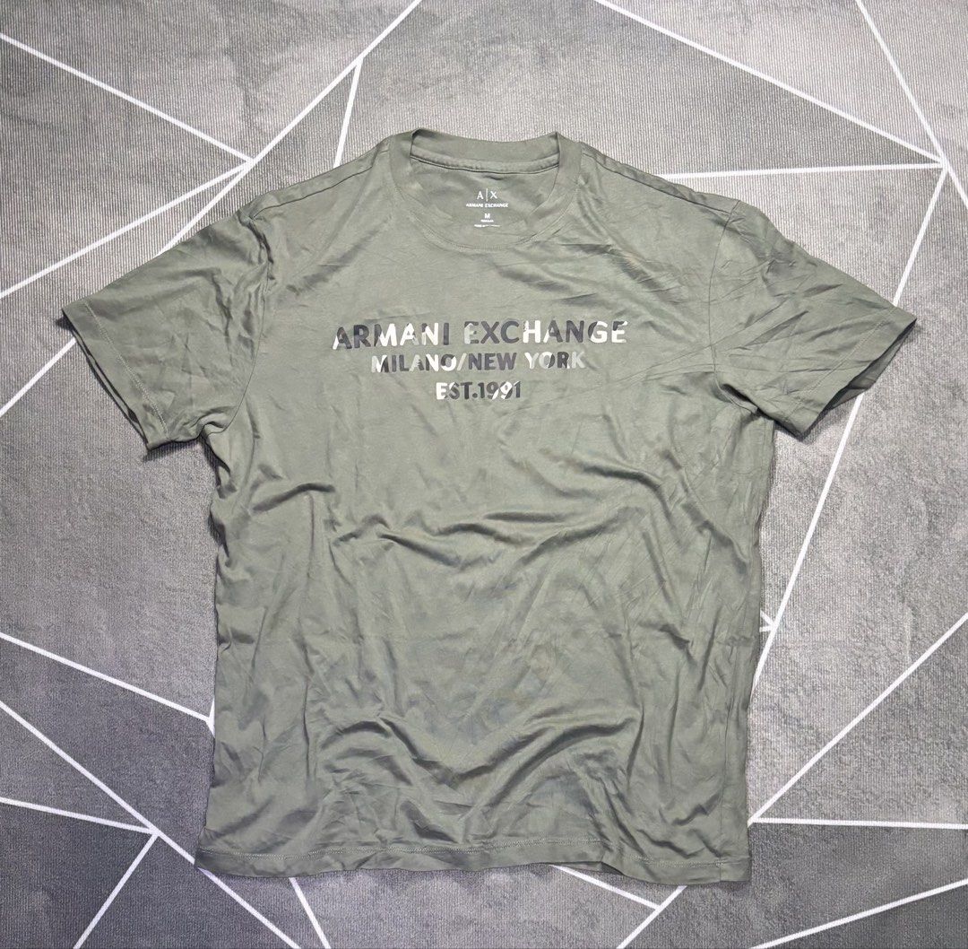 ARMANI EXCHANGE (Category: Tshirts & Polo Shirts ) located in Manila. Submitted by anthony_stark (Listing ID 1466913556, Image 2). Description: Armani exchange script camou Good as new / NO ISSUE MEDIUM ON TAG Width 22 Length 29 Cebu city 650+SF.