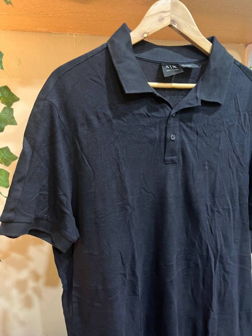 Armani Exchange Black Polo Shirt (Category: Luxury Apparel) located in Quezon City. Submitted by michypeachyy1 (Listing ID 1466807364, Image 2). Description: 750 plus shipping only XXL size good as new.