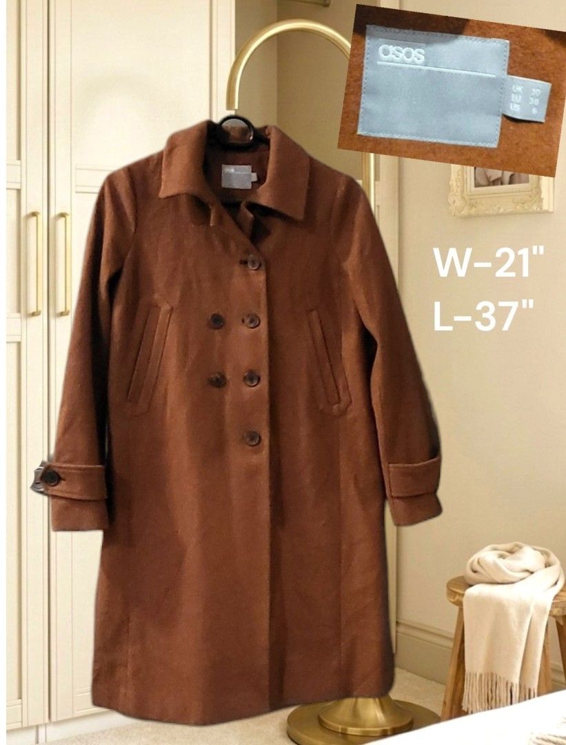 ASOS Brown Double-Breasted Wool Blend Coat Size UK 10 (Category: Coats, Jackets and Outerwear) located in Quezon City. Submitted by yusett (Listing ID 1466865439, Image 2). Description: - Brand: ASOS - Color: Brown - Material: Wool-blend fabric - Size: UK 10 / EU 38 / US 6 - Measurements: 21 inches width, 37 inches length - Design: Double-breasted, classic collar, front button closures, and structured sleeves with button cuffs - Pockets: Two side