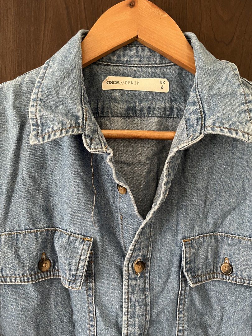 ASOS Denim Jacket (Category: Longsleeves) located in Manila. Submitted by mentone (Listing ID 1466841892, Image 1). Description: - Brand/Model: ASOS Denim - Size: UK 6 - Color/Wash: Light wash denim - Details: Two chest pockets, brown buttons, classic collar, curved hem, button cuffs - Styling: Perfect for easy daily wear, denim-on-denim looks, or layering over a tee.