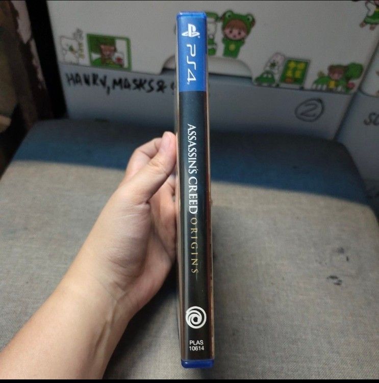 Assassin's Creed Origins PS4 Game (Category: PlayStation) located in Quezon City. Submitted by dncpreloved (Listing ID 1466884887, Image 3). Description: BOUGHT NEVER PLAYED - Title: Assassin's Creed Origins for PlayStation 4 - Setting: Explore ancient Egypt during the rise of the Brotherhood - Includes: Original blue case, game disc, cover art booklet, and warranty manual insert - Condition: Case and disc are both clean and well-maintained - Reg