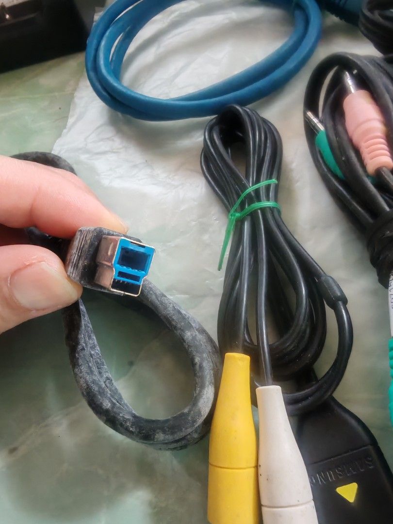 Assorted Display, Audio, and Data Cables Bundle (Category: Cables & Adaptors) located in Trece Martires City. Submitted by chipmaster74 (Listing ID 1466780530, Image 3). Description: - Assorted cable bundle: DVI, VGA, Ethernet, RCA audio, USB, and eSATA - Includes multiple lengths and various connector styles - Perfect for computer setups, older monitors, and home entertainment systems - Items are dusty from storage and need a quick wipe down bef