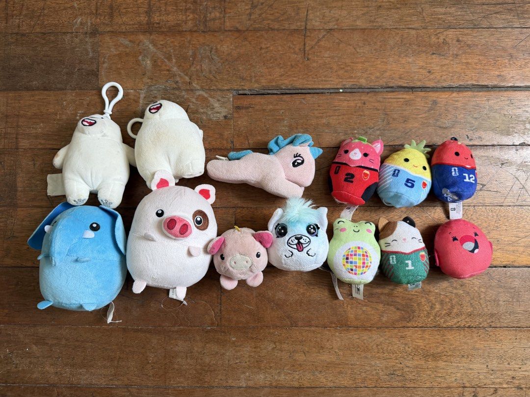 Assorted Mini Plush Toys Collection (Category: Plushies & Soft Toys) located in Binan City. Submitted by prelovedlagunaph (Listing ID 1466968101, Image 1). Description: Collection of small plush toys including bears, a pig, a blue elephant, and numbered character figures. Various colors like blue, pink, white, and red. Great for collectors, party favors, or kids. Some show minor dust or wear from storage. Selling as a bundle..