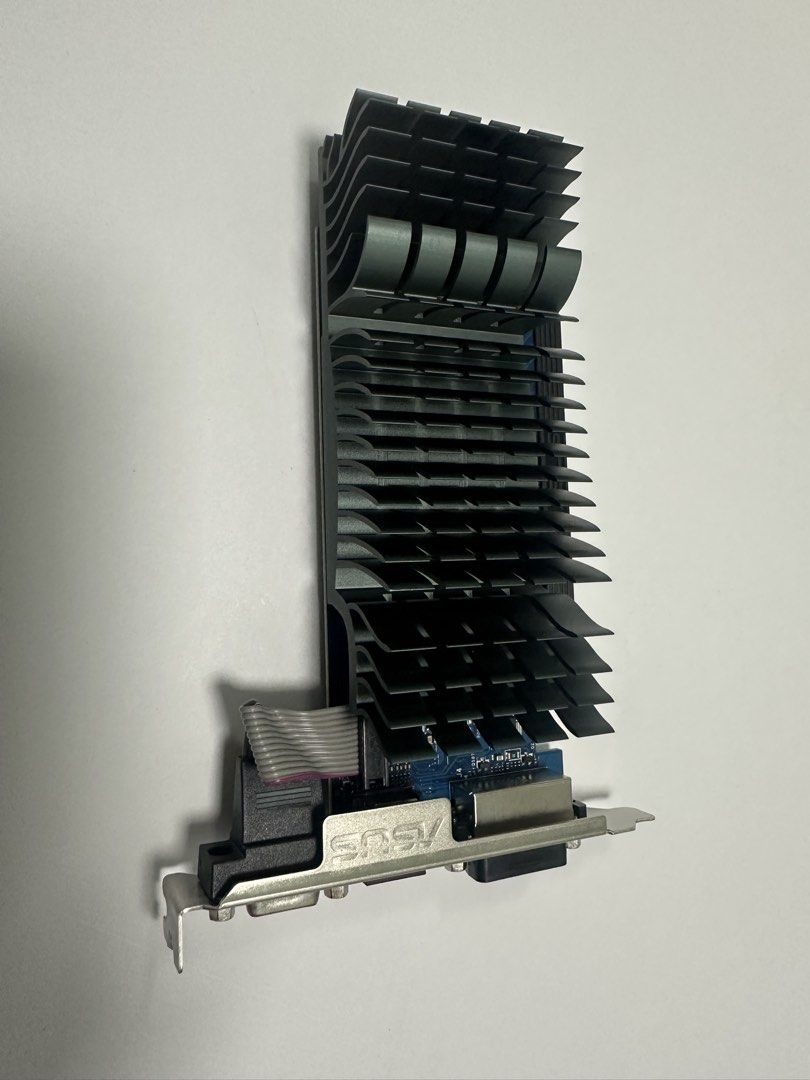 ASUS GT730-SL-2GD5-BRK Graphics Card (Category: Computer Parts) located in Las Pinas. Submitted by appthere (Listing ID 1466883782, Image 1). Description: - Model: ASUS GT730-SL-2GD5-BRK - Cooling: Silent passive heatsink design with 0dB fanless operation - Video Outputs: DVI, HDMI, and VGA ports included on the bracket - Form Factor: Compact low-profile bracket attached, ideal for small form factor PCs - Authenticity: Original model label and ba