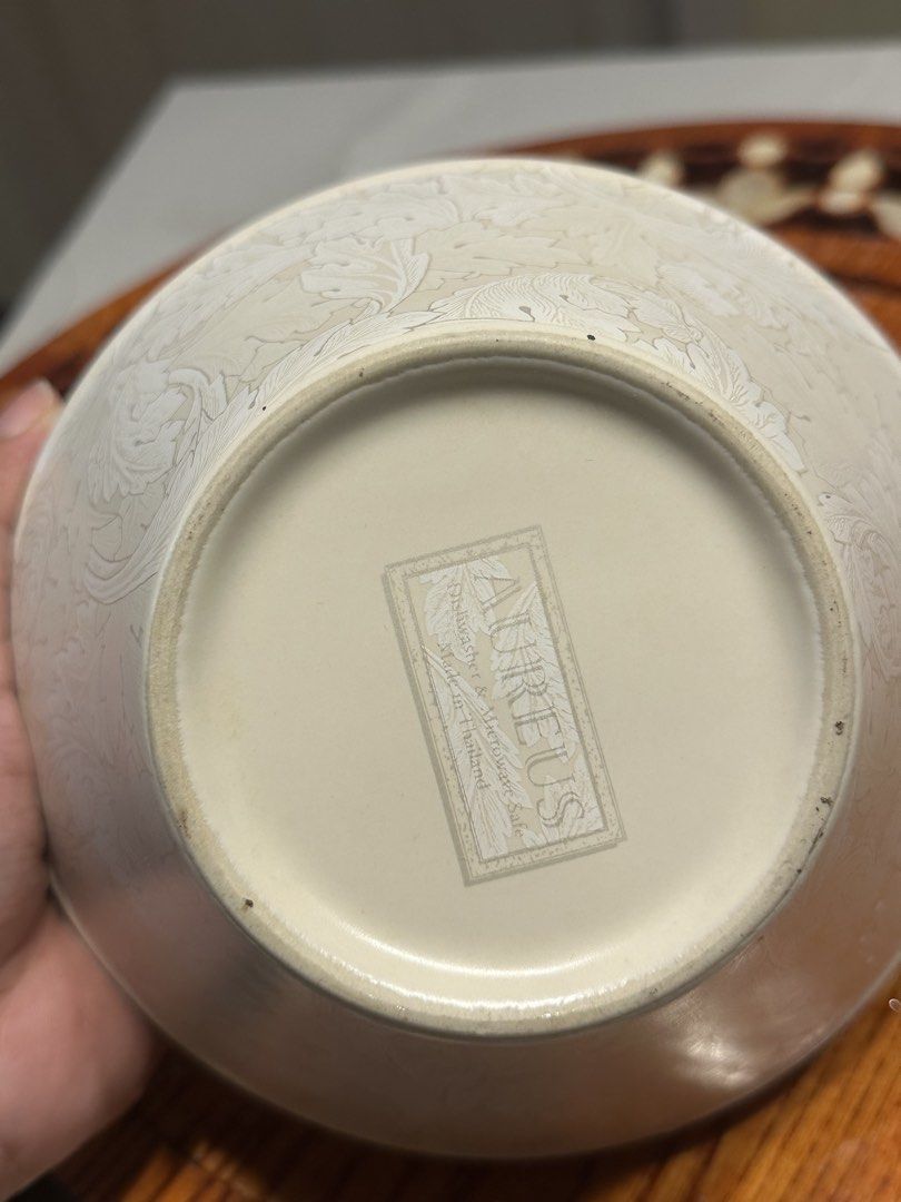 Aureus Leaf Pattern Ceramic Bowls Set of 3 (Category: Dinnerware & Cutlery) located in Manila. Submitted by tenshiii185 (Listing ID 1466915690, Image 2). Description: - Set of 3 ceramic bowls from Aureus, made in Thailand - Cream background with a detailed leaf and botanical pattern - Microwave and dishwasher safe for easy daily use - Stackable design with slightly flared rims for neat storage - Versatile size great for cereal, soup, or side dish