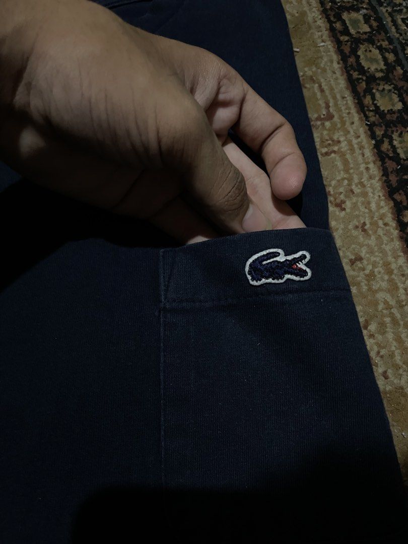 AUTHENTIC LACOSTE POCKET TEE NAVY BLUE COLORWAY (Category: Tshirts & Polo Shirts ) located in Cagayan de Oro. Submitted by dwight_666 (Listing ID 1466779555, Image 3). Description: medium on tag 21x27 complete tag good condition flawless no issue color rate: 9/10 .
