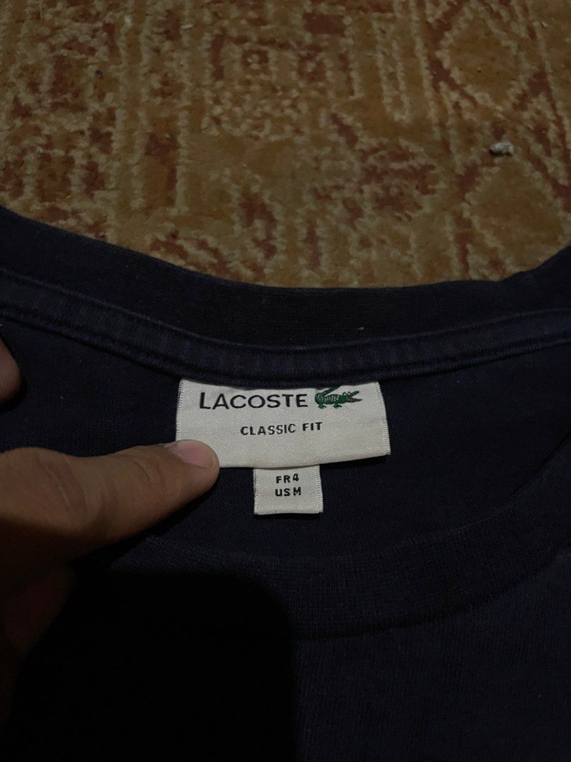 AUTHENTIC LACOSTE POCKET TEE NAVY BLUE COLORWAY (Category: Tshirts & Polo Shirts ) located in Cagayan de Oro. Submitted by dwight_666 (Listing ID 1466779555, Image 2). Description: medium on tag 21x27 complete tag good condition flawless no issue color rate: 9/10 .
