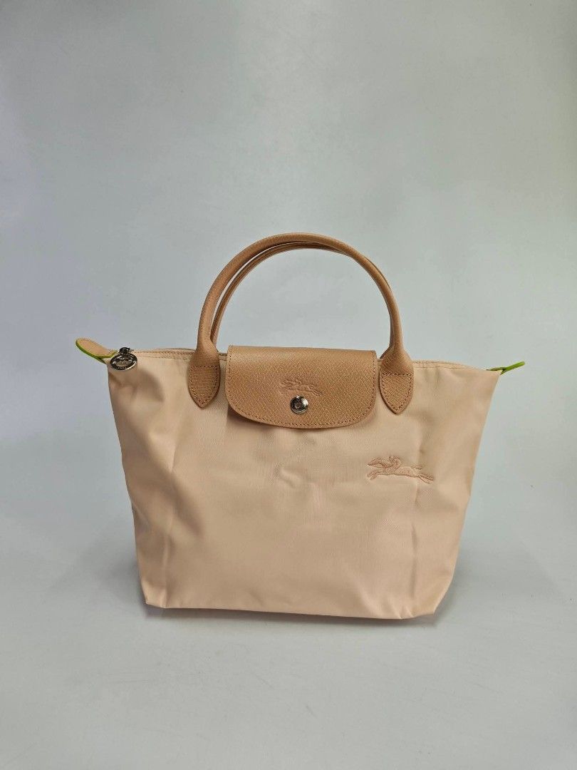 Authentic Longchamp Club Small Short Handle Bag - Light Pink (Category: Luxury Bags & Wallets) located in Quezon City. Submitted by hollowwillow (Listing ID 1466786085, Image 1). Description: Small Short Handle/ Top Handle 14"w x 8.7"h x 5.5"d inches.