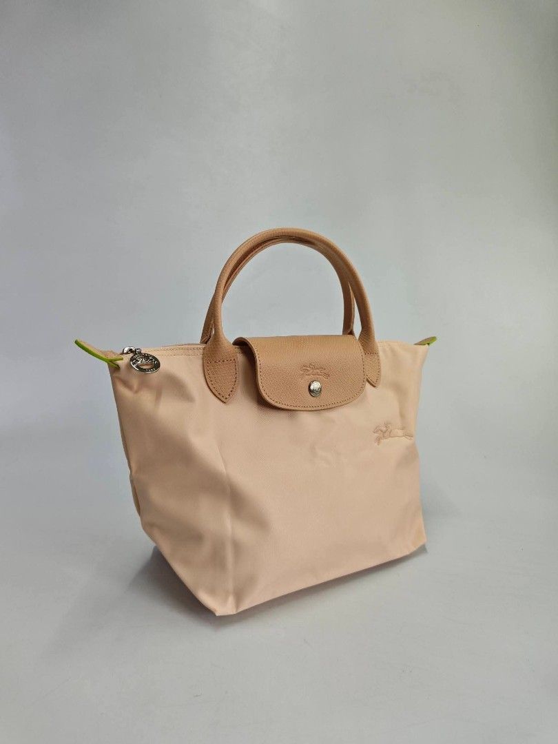 Authentic Longchamp Club Small Short Handle Bag - Light Pink (Category: Luxury Bags & Wallets) located in Quezon City. Submitted by hollowwillow (Listing ID 1466786085, Image 2). Description: Small Short Handle/ Top Handle 14"w x 8.7"h x 5.5"d inches.