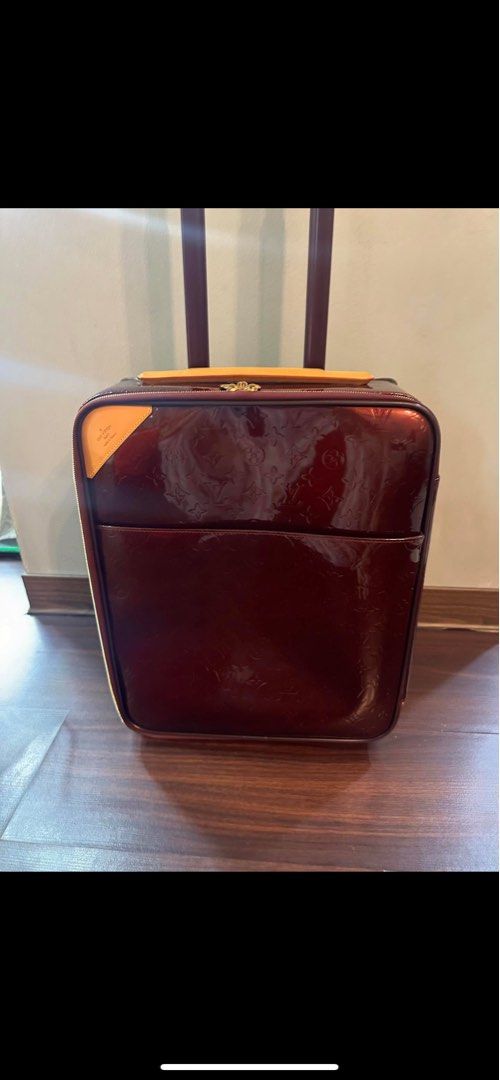 Authentic Louis Vuitton Pegase 45 Monogram Vernis Burgundy (Category: Luxury Bags & Wallets) located in Manila. Submitted by roseluxuryitems (Listing ID 1466932934, Image 1). Description: - Authentic Louis Vuitton rolling luggage in Amarante deep burgundy - Iconic debossed Monogram Vernis patent leather with vachetta trim - Telescopic handle and smooth-rolling wheels for easy airport maneuverability - Secure gold-tone zippers with dual pulls and 