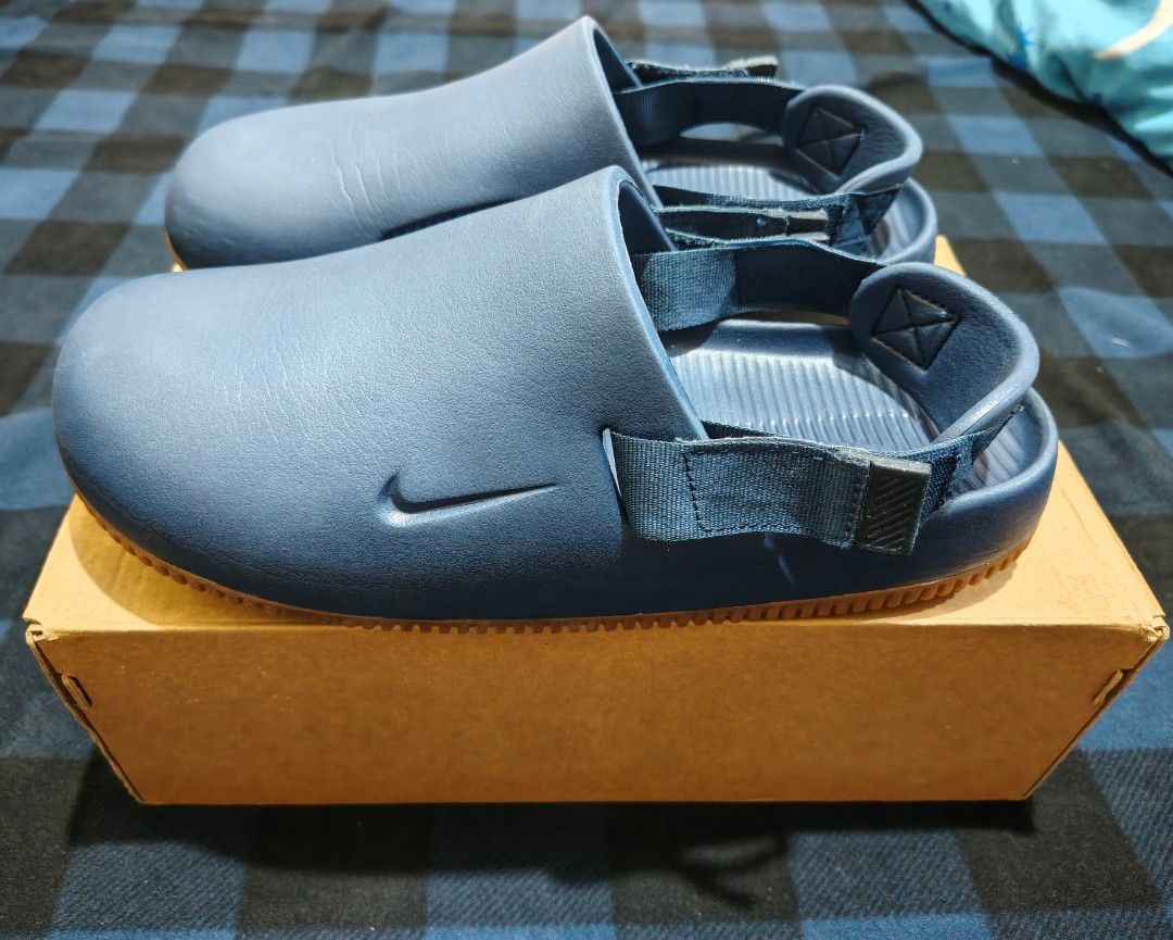 Authentic Nike Calm Mule size 10us (Category: Slippers & Slides) located in Mandaluyong City. Submitted by stitchesandstrings (Listing ID 1466909353, Image 2). Description: Di na nagagamit, minsan lang din nagamit. Authentic with og box. Size 10us Mandaluyong area.