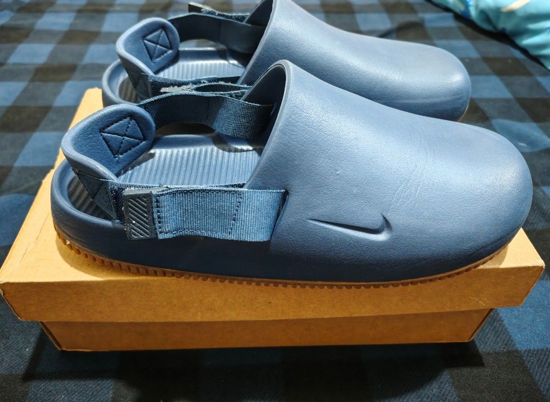 Authentic Nike Calm Mule size 10us (Category: Slippers & Slides) located in Mandaluyong City. Submitted by stitchesandstrings (Listing ID 1466909353, Image 3). Description: Di na nagagamit, minsan lang din nagamit. Authentic with og box. Size 10us Mandaluyong area.